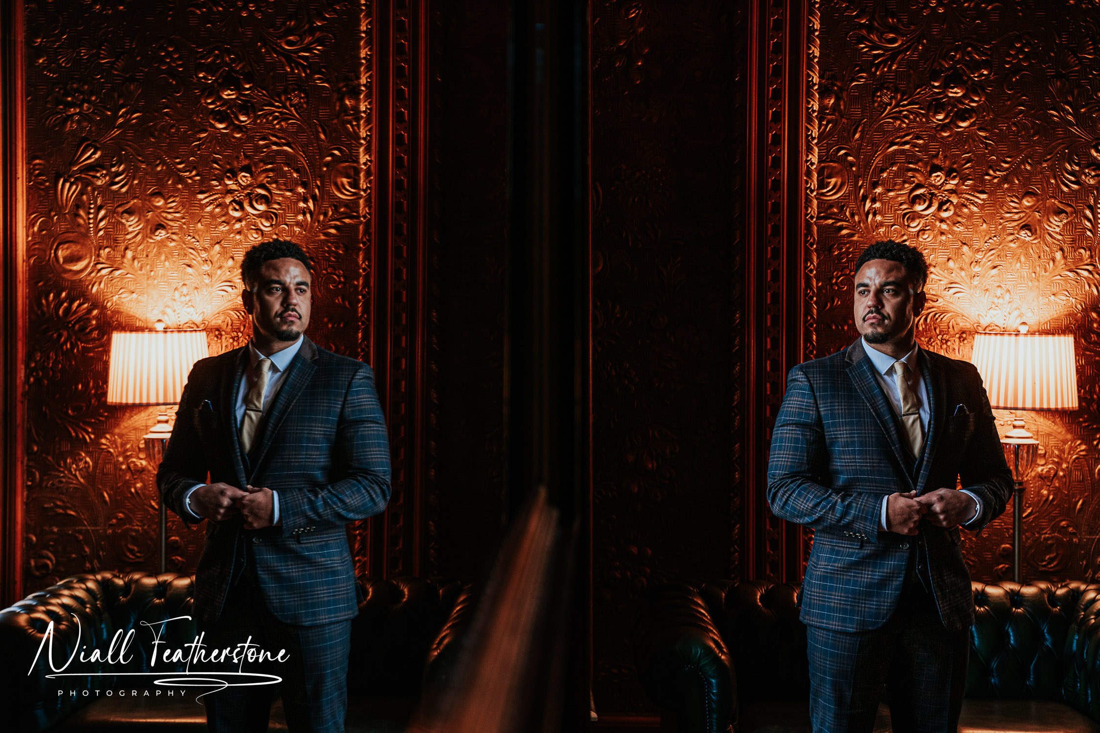 photo of groom getting ready at a wedding and his reflection in a mirror
