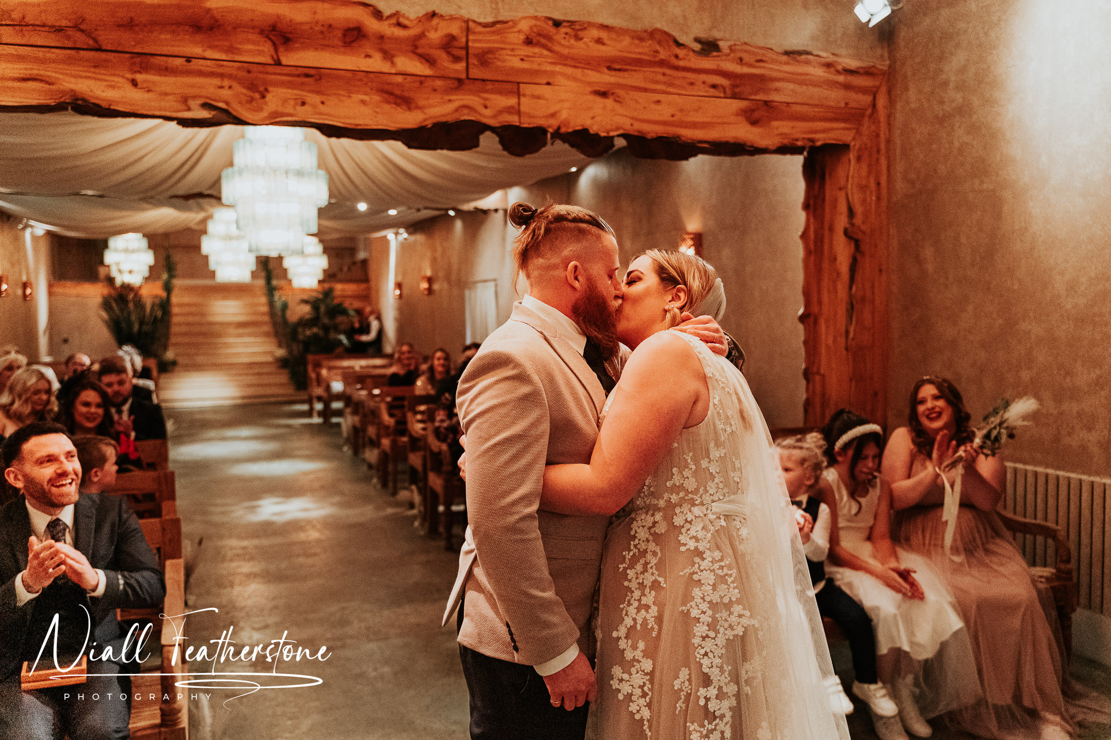 Bride and Groom share first kiss during wedding ceremony at Runa Farm