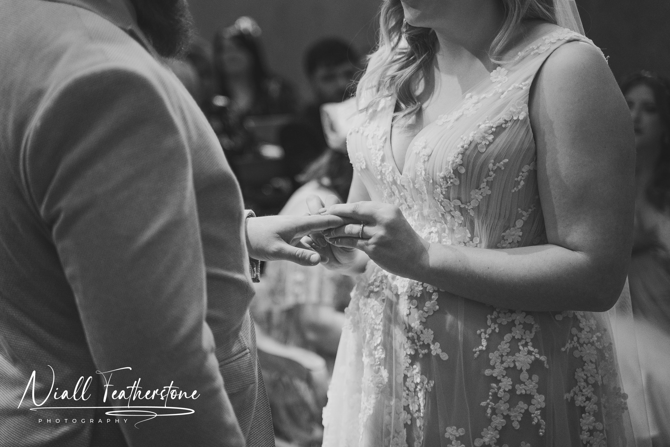 Bride and Groom exchange rings at Runafarm during wedding ceremony